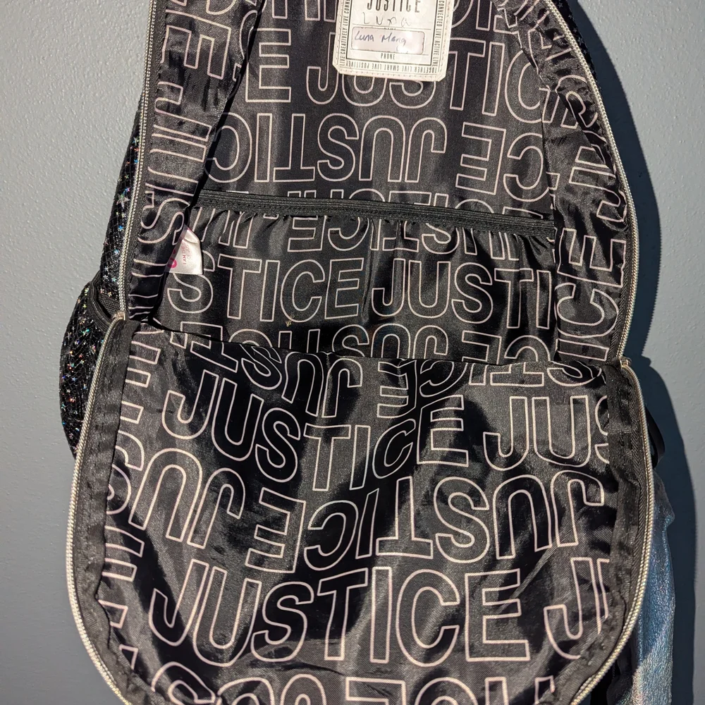 Justice Black Glitter Star Backpack with Rainbow Stripe